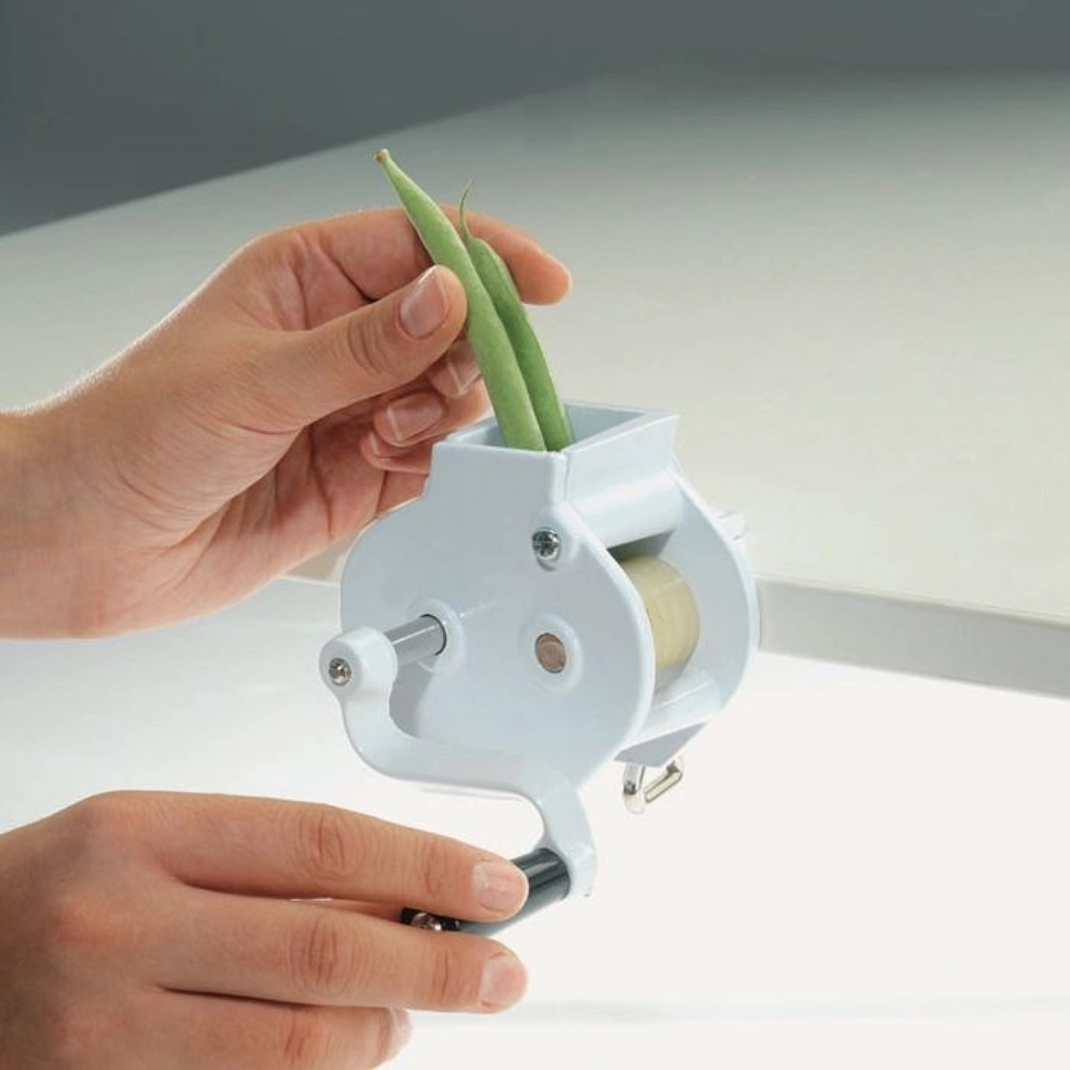 Coupe-haricots dans le sens de la longueur