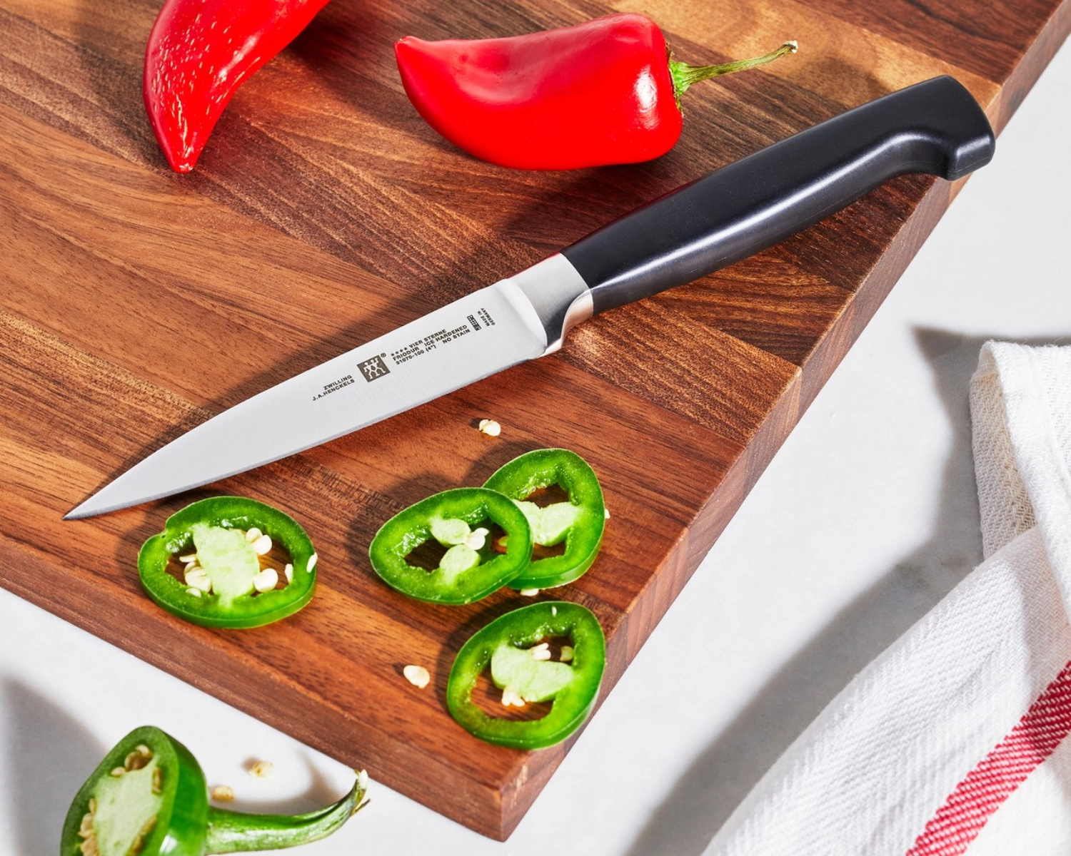 2x couteaux four star (couteau d'office+couteau de cuisine)