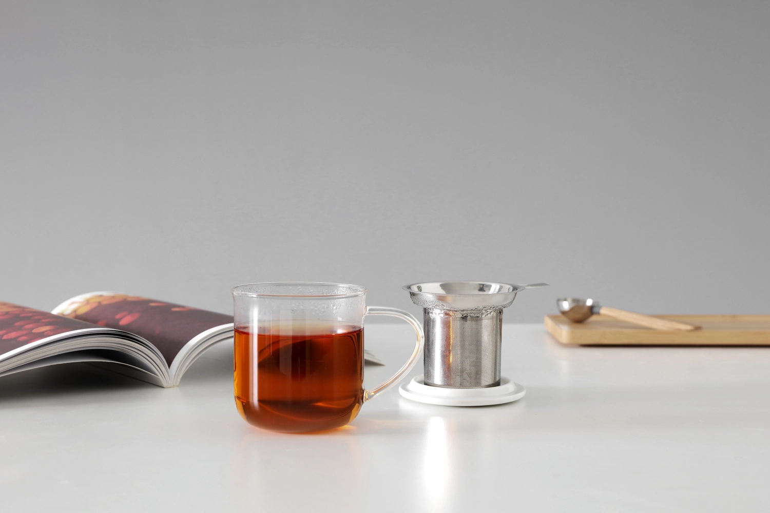 Minima passoire à thé avec couvercle céramique blanc